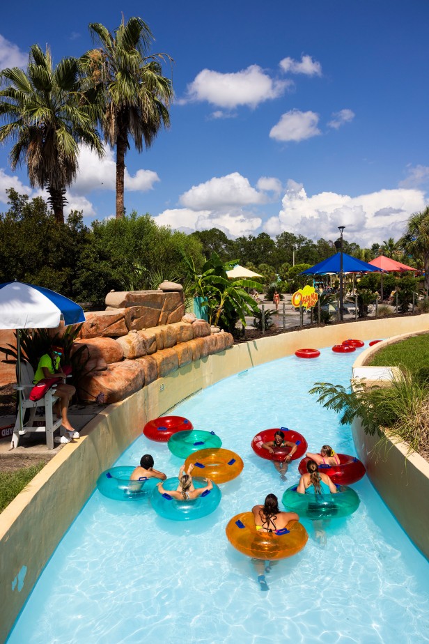People floating on inner tubes on the lazy river at Splash Island Water Park in Valdosta, Georgia