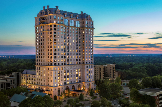Exterior of the St. Regis Atlanta at sunset. Photo by @stregisatl