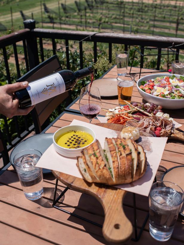 A table of food and wine at Montaluce Winery in Dahlonega, Georgia