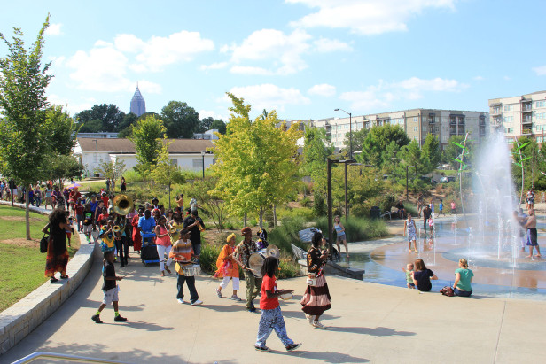 People near the fountain in Historic Fourth Ward Park in Atlanta
