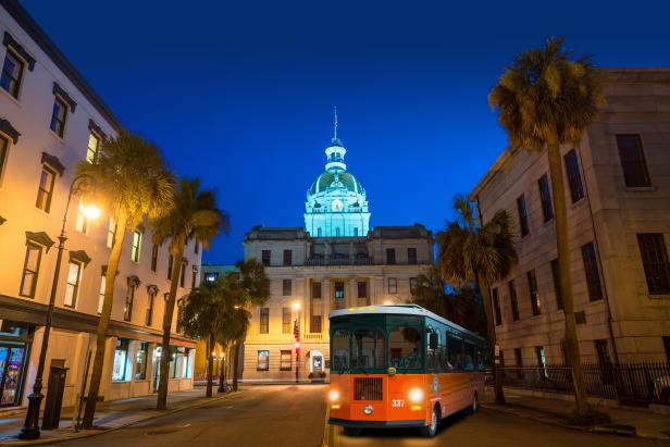 Old capitol building lit up at night