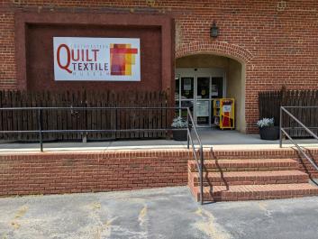 Museum entrance off Bradley Street, ramp to the right. 