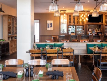 Sister's inviting dining room opens onto a patio overlooking Peachtree street in the heart of Atlanta's Buckhead neighborhood.