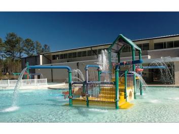 Collins Hill Aquatic Center's seasonal, outdoor leisure play pool will keep your kids happy. Visit gwinnettparks.com for hours and rental information.