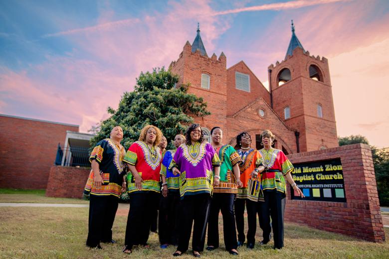 Freedom Singers perform in front of Mt. Zion Church