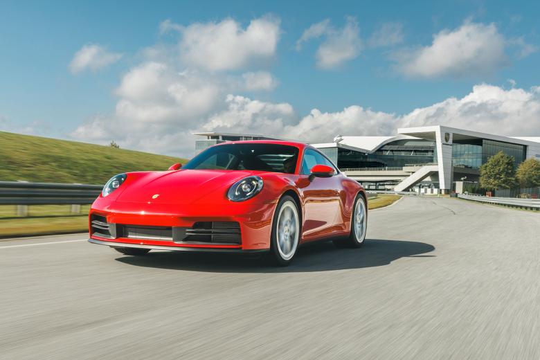 Red Porsche on the track at Porsche Experience Center in Atlanta, Georgia