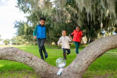 kids running to find Island Treasures on Jekyll Island, Georgia