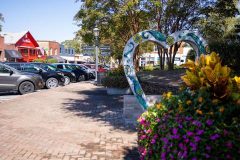Public art lines a brick lane in Downtown Roswell, Georgia. Photo by @benjamingalland