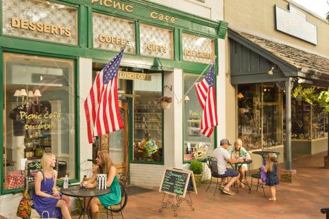 People sitting at tables outside the Picnic Cafe in Dahlonega, Georgia