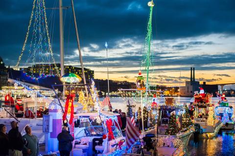Boats decorated in holiday lights for the Christmas Boat Parade in Savannah, Georgia. Photo by Geoff L. Johnson