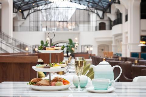 A formal tea place setting inside an upscale restaurant