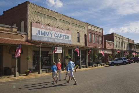 Family crossing street in Plains, Georgia