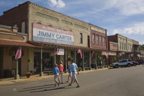 Family crossing street in Plains, Georgia