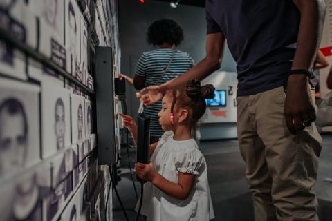 Small girl and father at National Center for Civil and Human Rights in Atlanta, Georgia