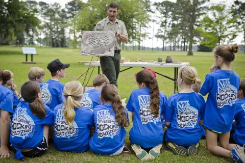 Ranger and kids at Kolomoki Mounds State Park in Blakely, Georgia