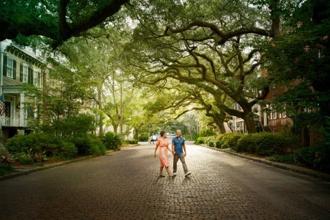 Couple walking on Jones Street in Savannah, Georgia