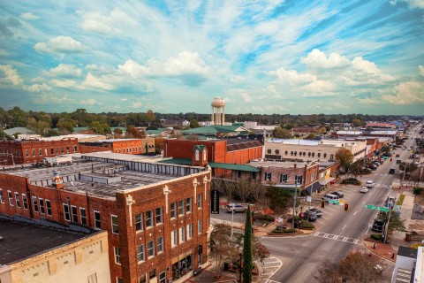 Aerial view of Douglas with sunny blue sky above the city.