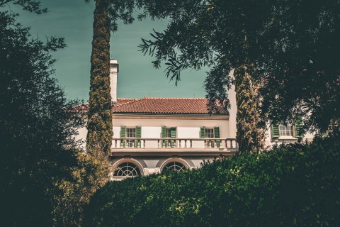 Hills & Dales Estate exterior building surrounded by trees 