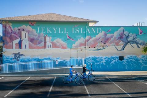 Cyclists near the Jekyll Island mural