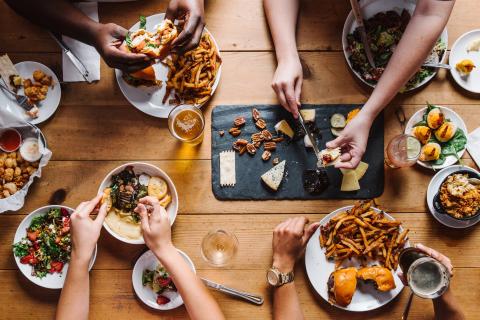 Overhead view of a table of food at Sweet Grass Dairy & Cheese Shop in Thomasville, Georgia