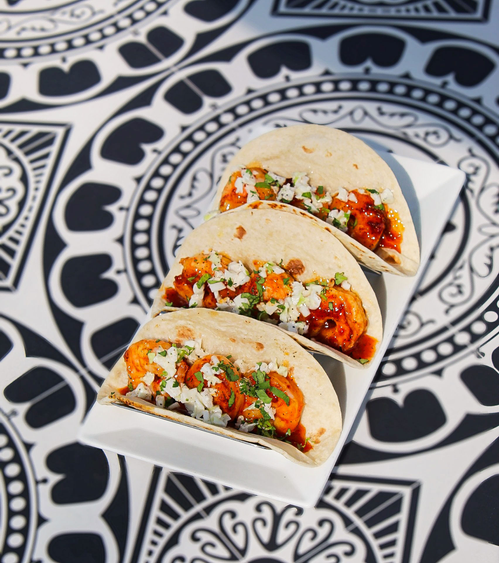 Plate of three shrimp tacos at Lake House Tap in Eatonton, Georgia