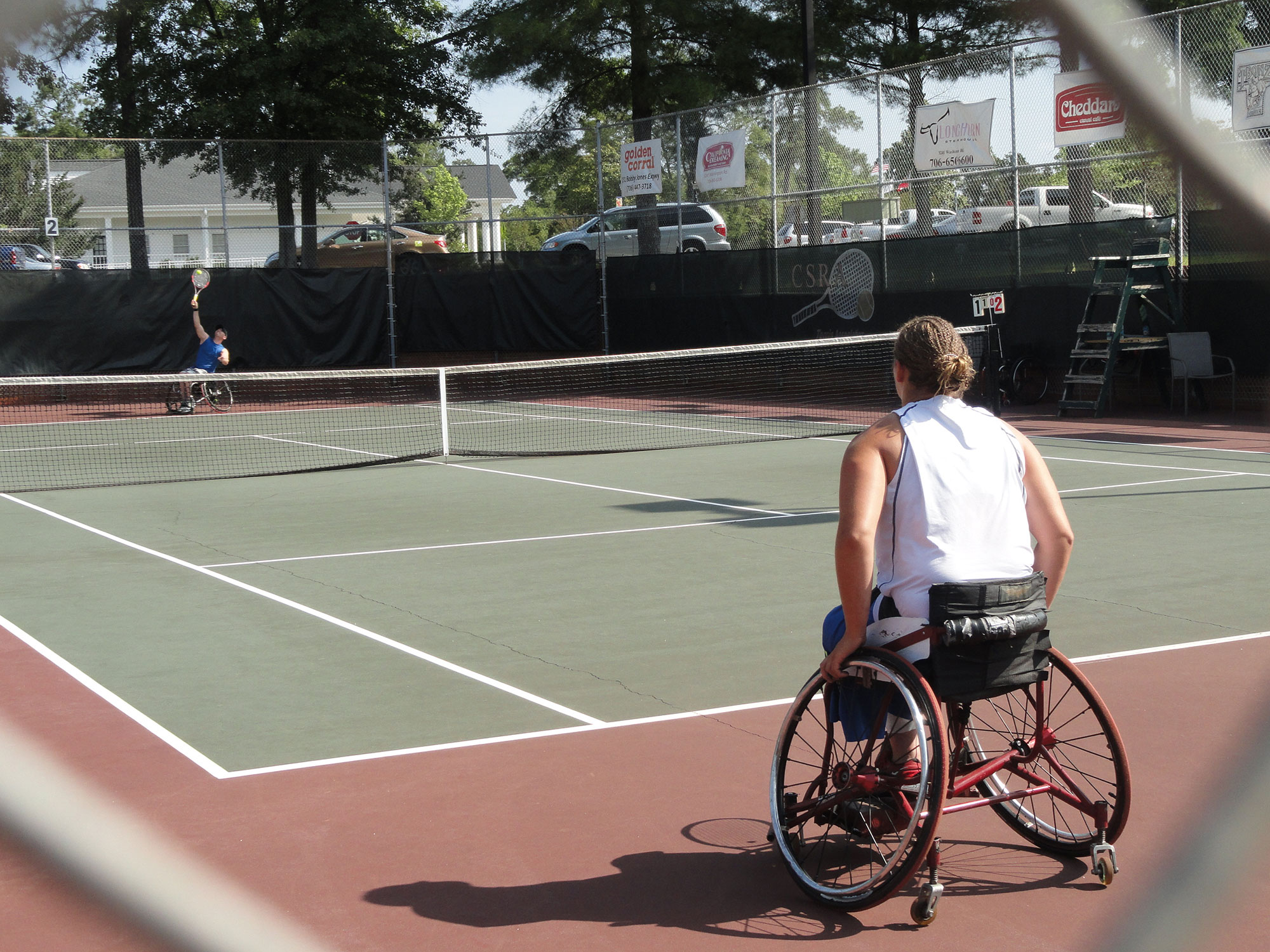 Two people playing tennis in wheelchairs in Augusta, Georgia